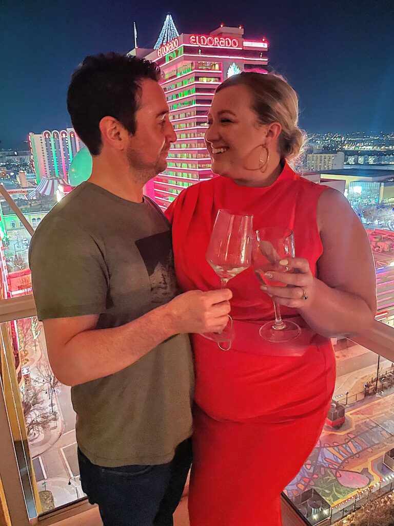 Gabbi poses with her husband in downtown reno, Nevada