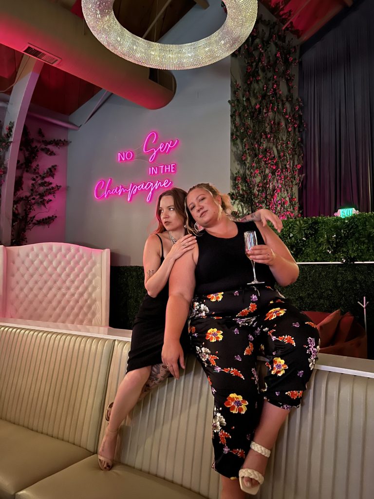 Gabbi and Cass pose in the Champagne Room in Morgan Hill