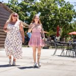 two women strolling around a Morgan Hill winery